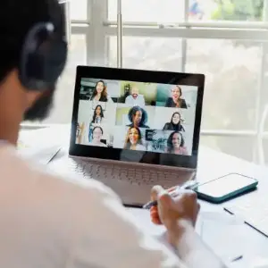 A person setting goals and creating a schedule A person setting goals and creating a schedule