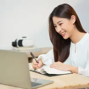 student learning online with laptop